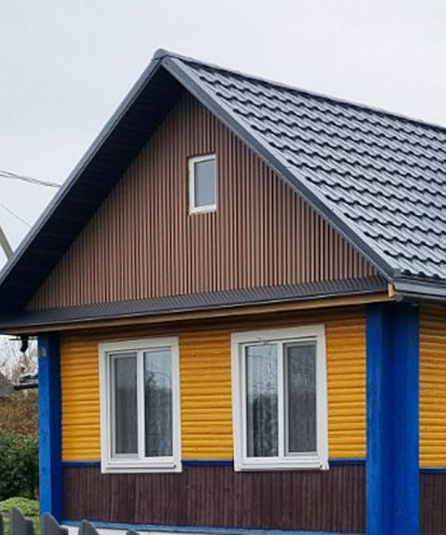 3D-панели ДПК на фасаде частного дома