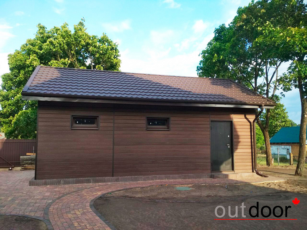 Вентфасад гаража из фасадной доски ДПК Outdoor