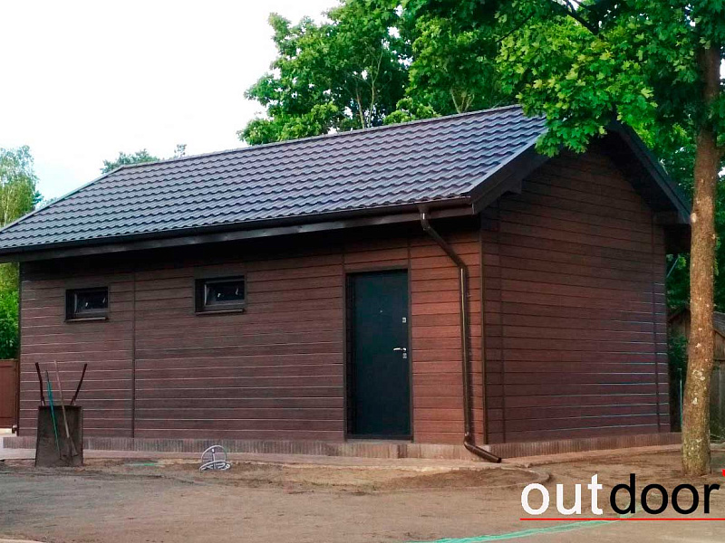 Вентфасад гаража из фасадной доски ДПК Outdoor