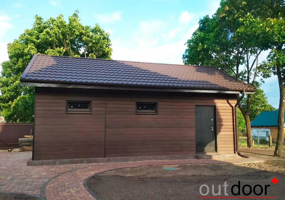 Вентфасад гаража из фасадной доски ДПК Outdoor Вентфасад гаража из фасадной доски ДПК Outdoor